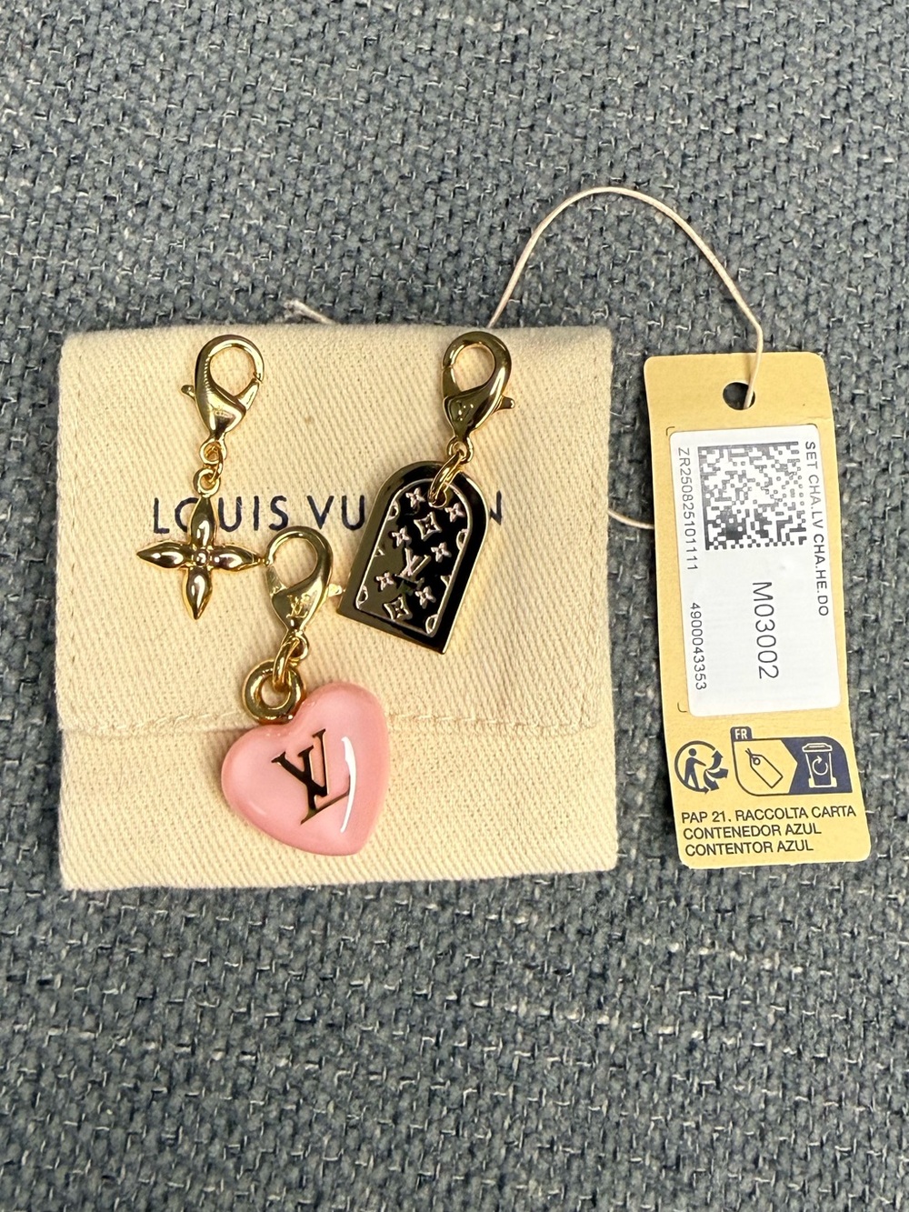 Louis Vuitton trio charms